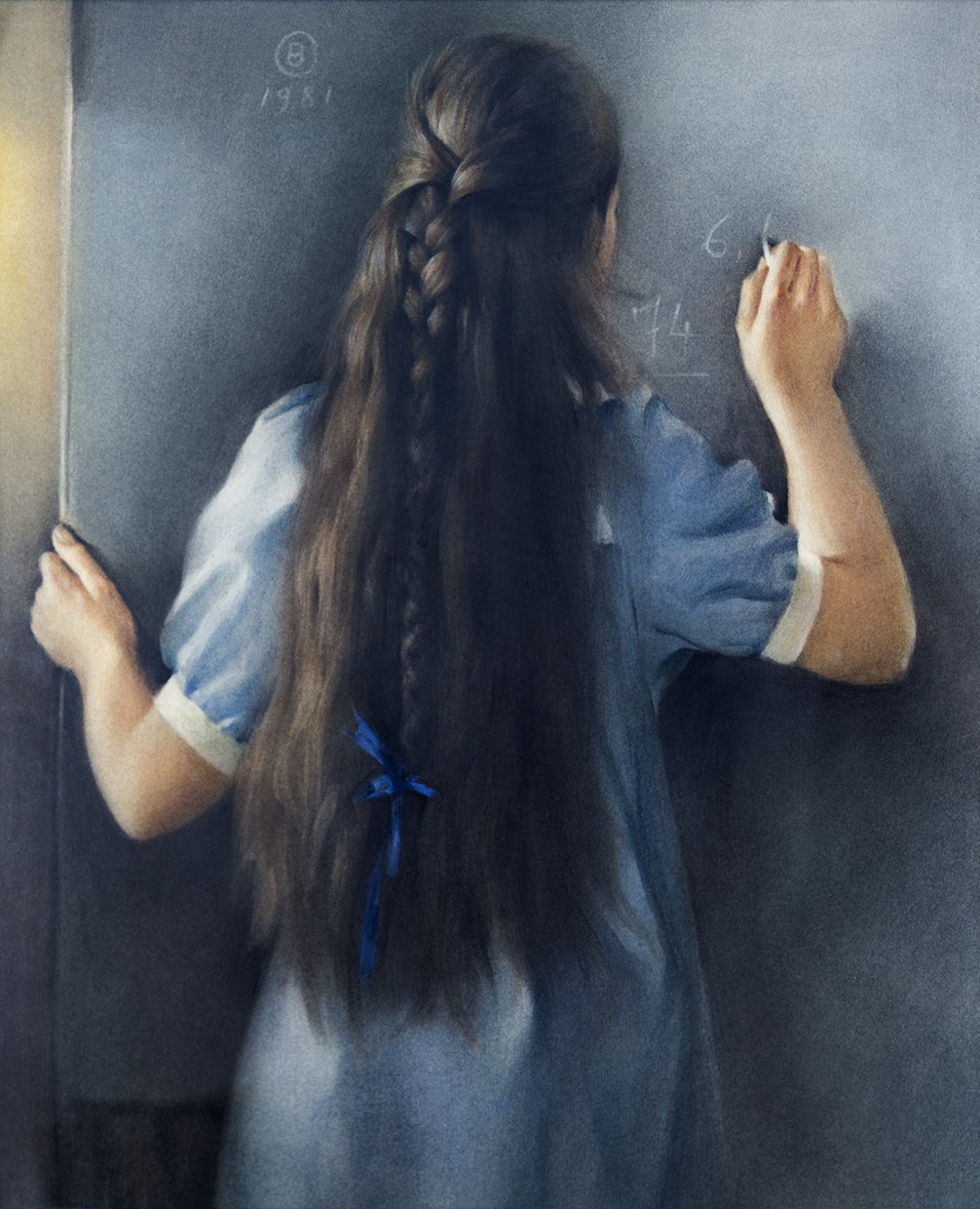 Niña en la pizarra