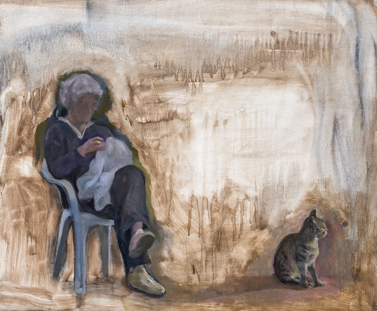 Christiane bordando con el gato